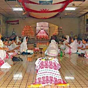 Women singing Kirttana in the Nama-ghara